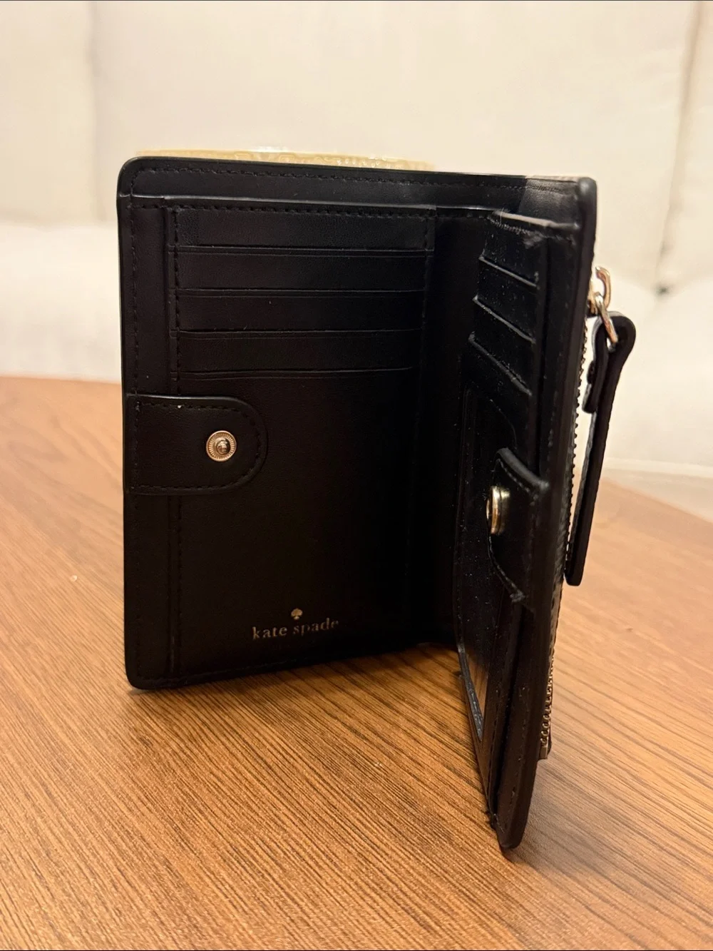 kate spade black leather wallet with gold logo